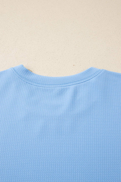 Light Blue Textured Bodice Contrast Floral Sleeve Plus Size Top